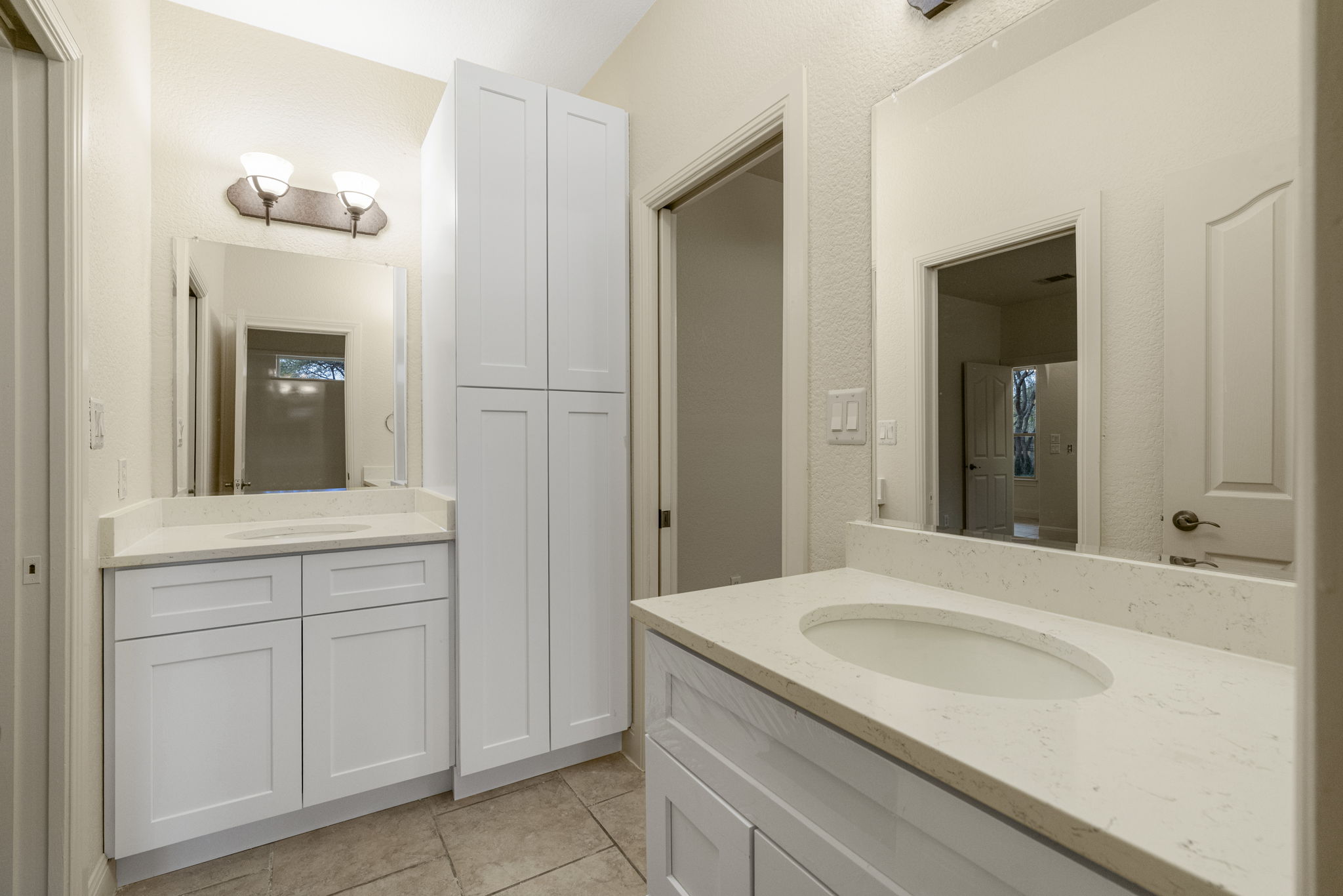 301 Goldridge Drive Georgetown, TX 78633 - Photo 24 of 40 The full bath connecting the 2 bedrooms has a dual vanity.