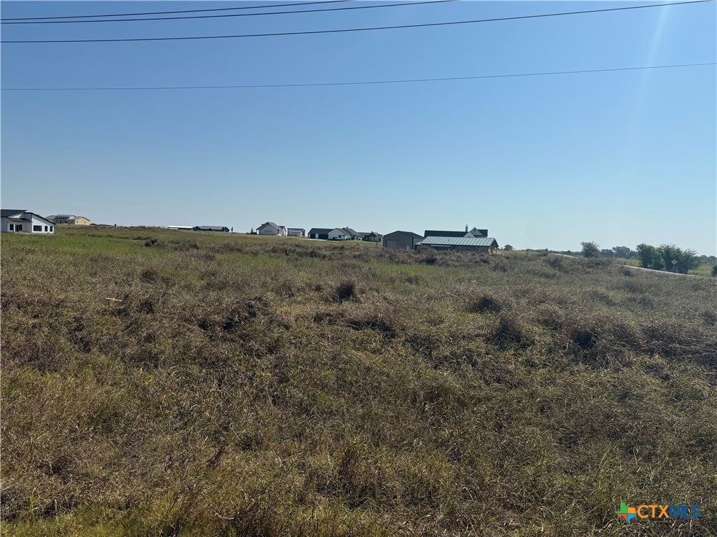 Tbd - Lot 25 Tbd - Loop Salado, TX 76571 - Photo 5 of 9 a view of a dry field with trees in background