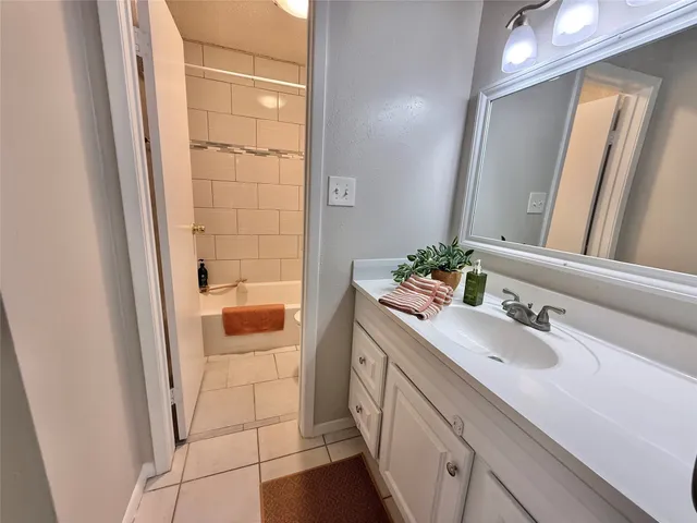 a room with lots of different colored cloths and swimming pool