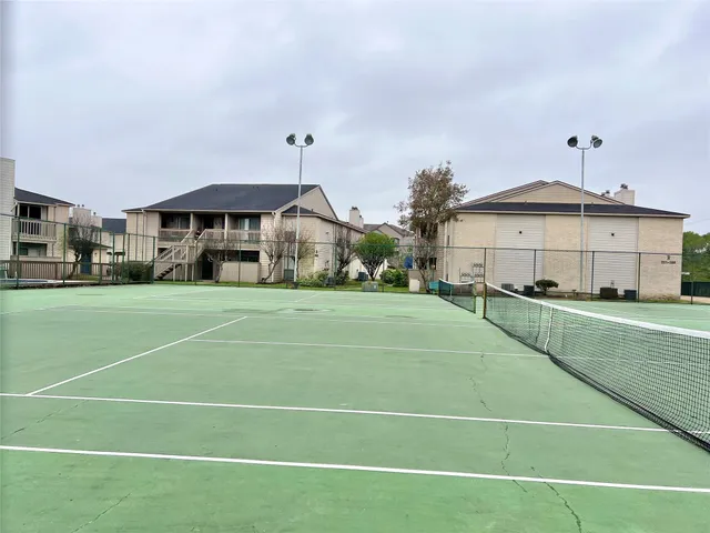 a view of swimming pool with outdoor seating and yard