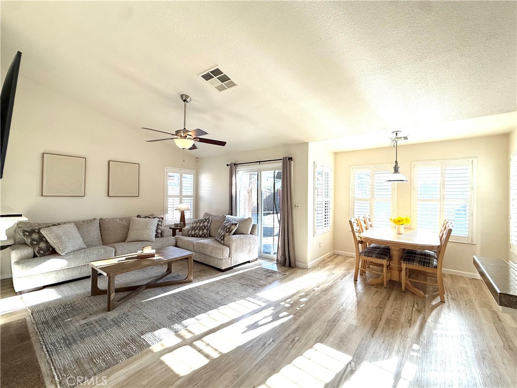 2709 Big Sandy Avenue Merced, CA 95348 - Photo 10 of 51 a living room with furniture and wooden floor