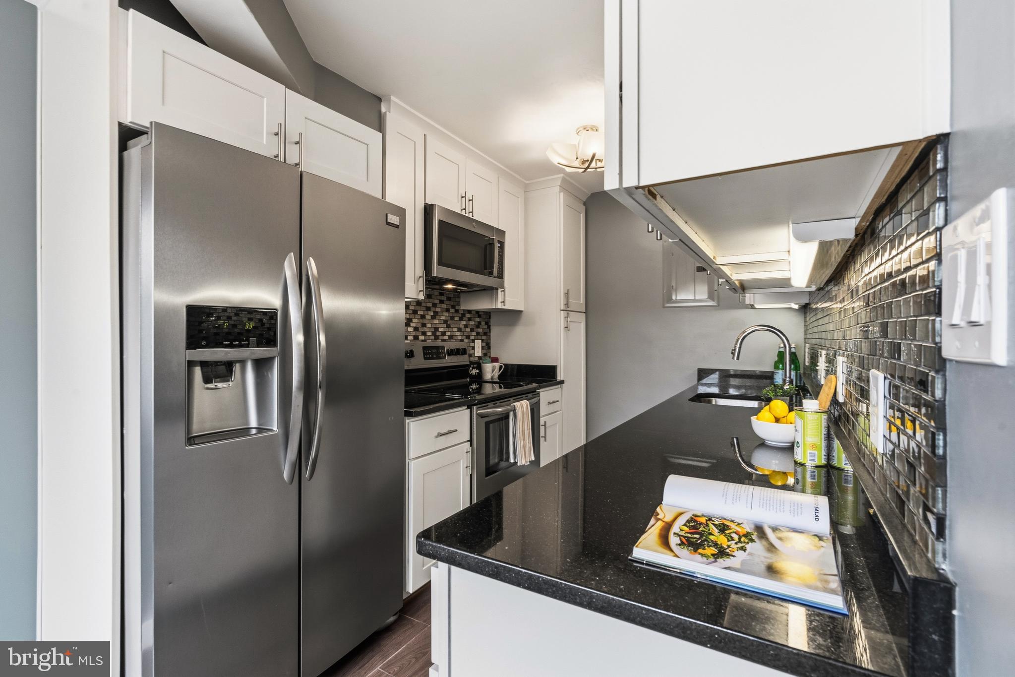 7034 Strathmore Street, Unit 306 Chevy Chase, MD 20815 - Photo 6 of 23 Kitchen