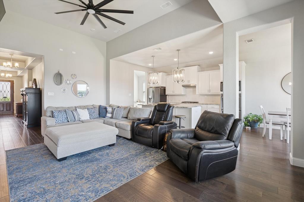 11375 Misty Ridge Drive Flower Mound, TX 76262 - Photo 15 of 39 a living room with furniture and a large window