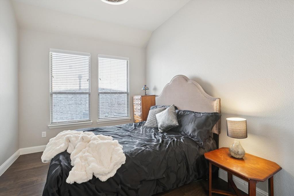 11375 Misty Ridge Drive Flower Mound, TX 76262 - Photo 27 of 36 a bedroom with a bed and a window