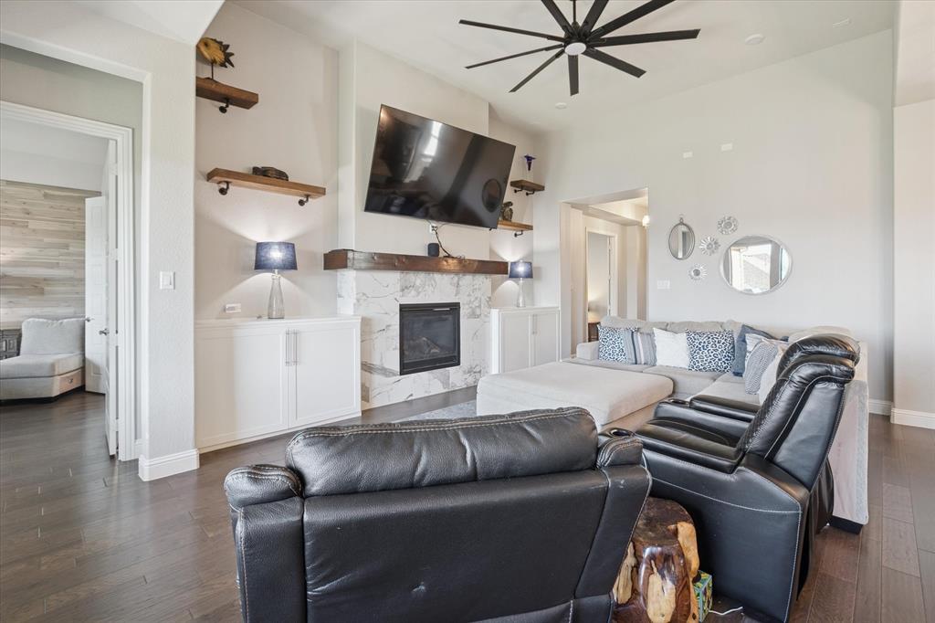 11375 Misty Ridge Drive Flower Mound, TX 76262 - Photo 8 of 39 a living room with furniture and a flat screen tv