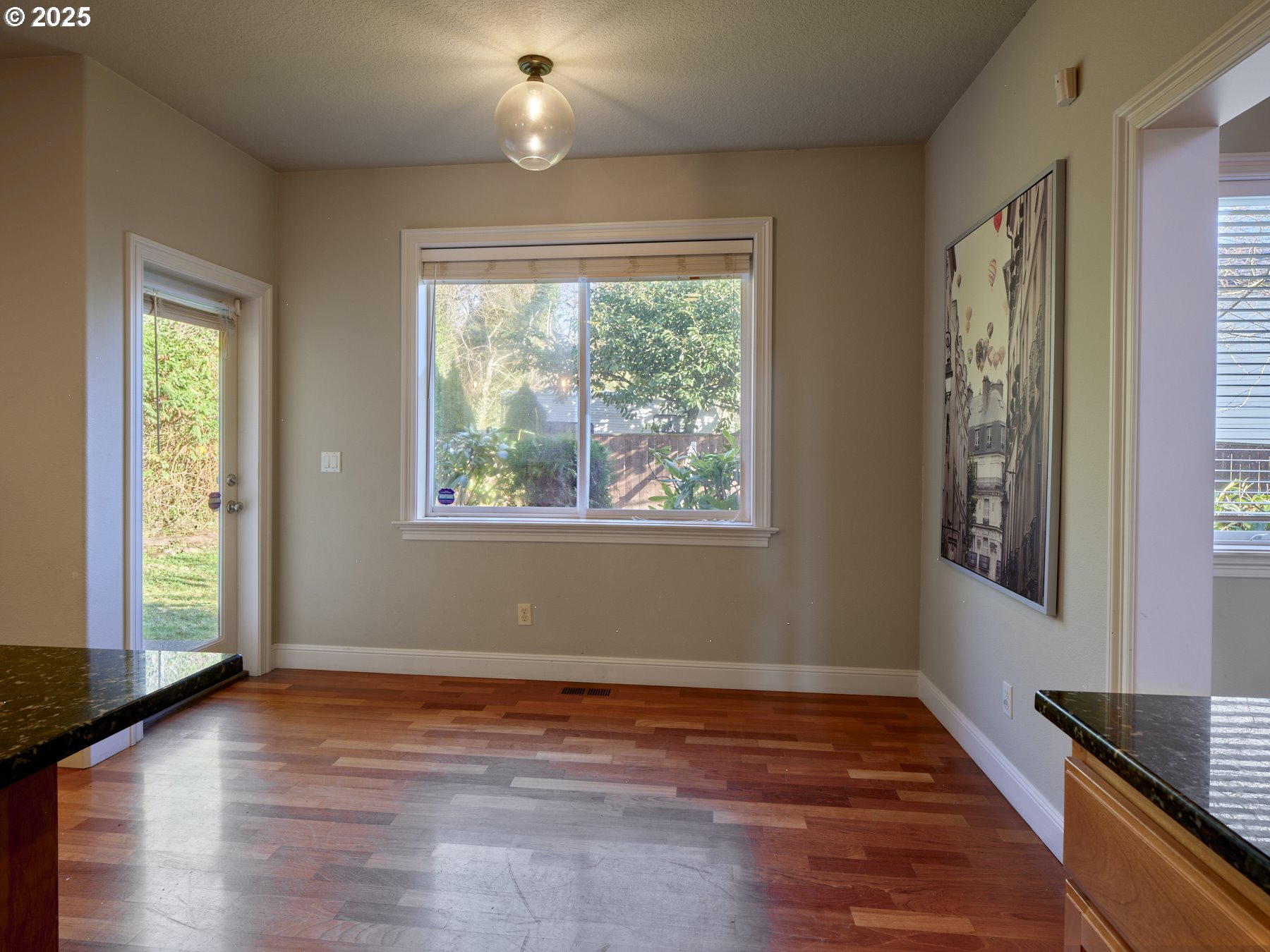 10410 Southeast French Road Vancouver, WA 98664 - Photo 11 of 43 a view of an empty room with wooden floor and a window