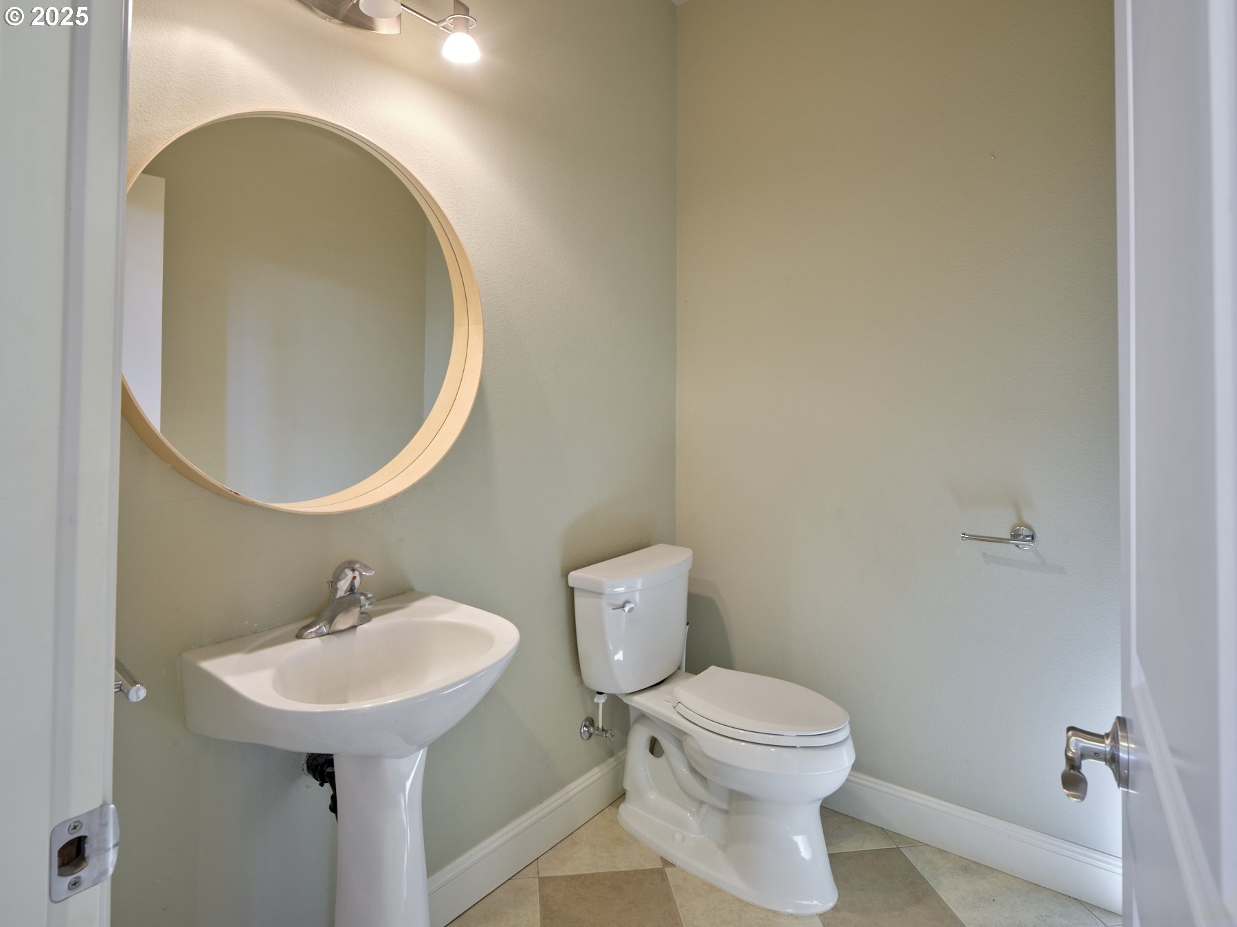 10410 Southeast French Road Vancouver, WA 98664 - Photo 23 of 43 a bathroom with a sink toilet and a mirror