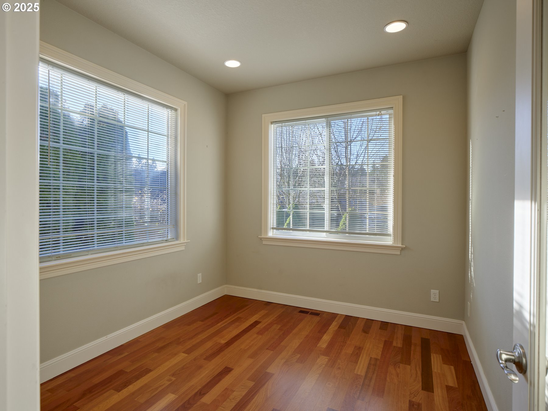 10410 Southeast French Road Vancouver, WA 98664 - Photo 24 of 43 an empty room with wooden floor and windows
