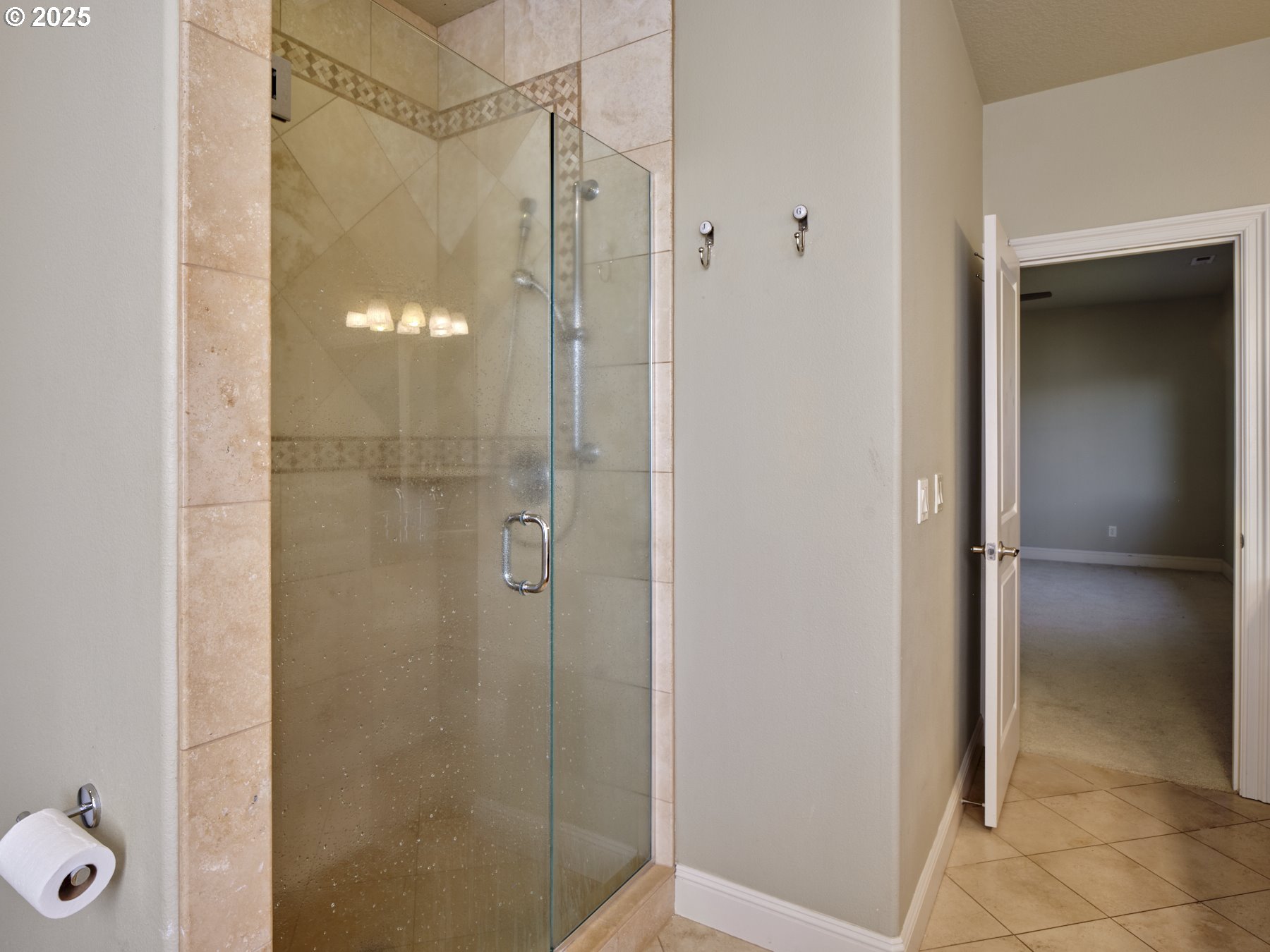 10410 Southeast French Road Vancouver, WA 98664 - Photo 32 of 43 a bathroom with a glass shower door