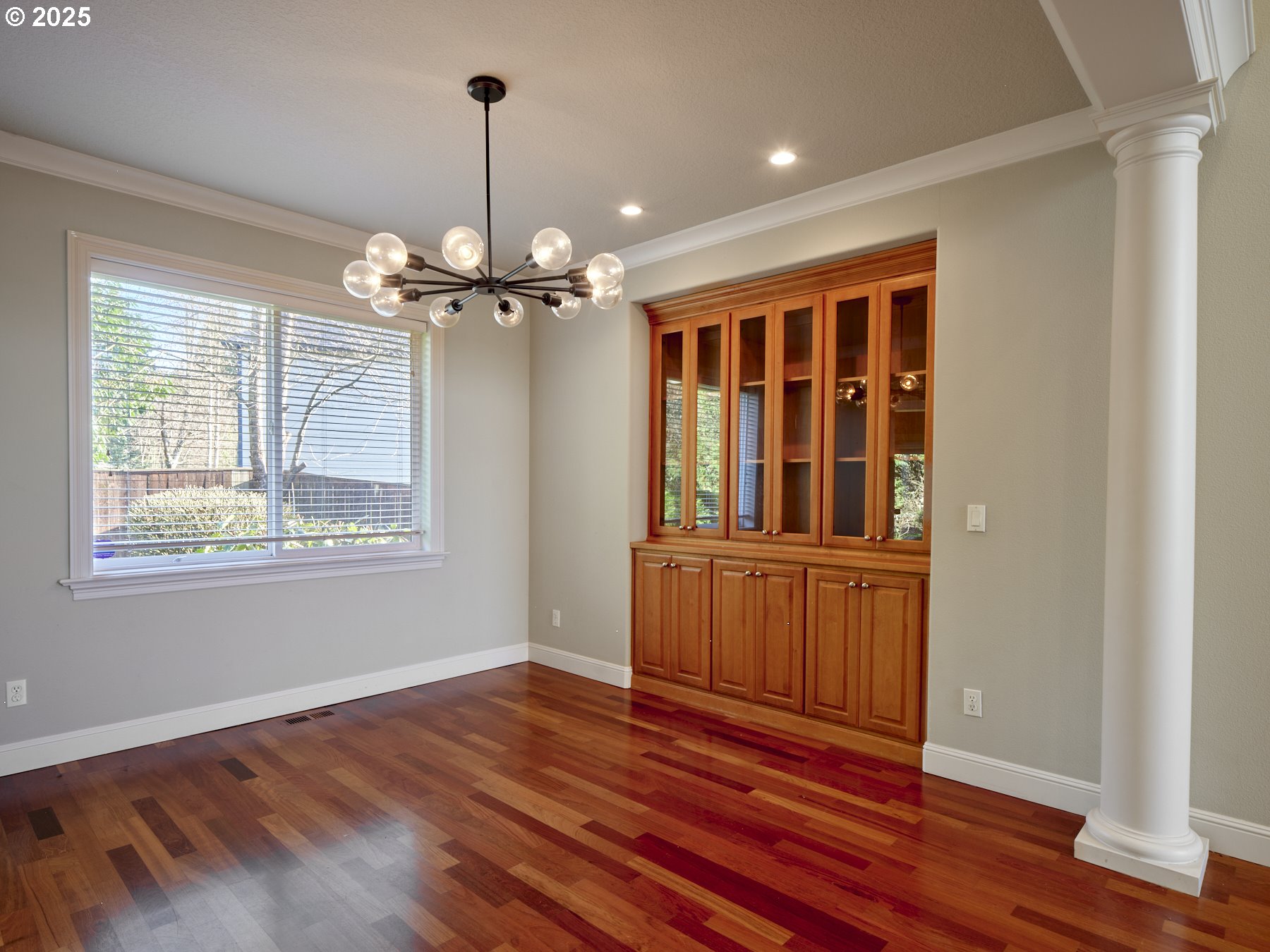 10410 Southeast French Road Vancouver, WA 98664 - Photo 7 of 43 a view of an empty room with wooden floor and a window