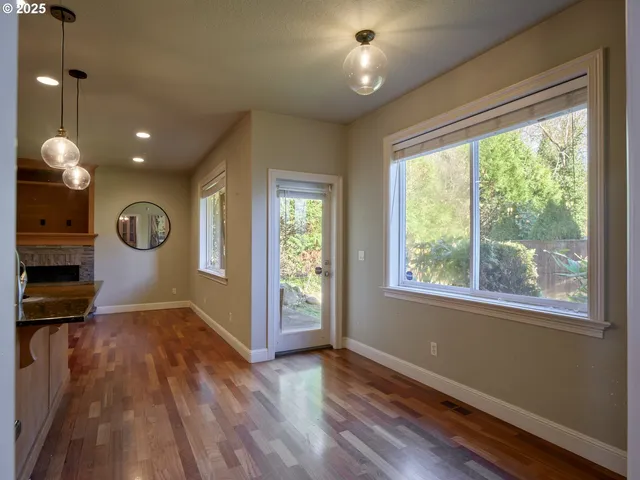 a view of livingroom with furniture wooden floor and window