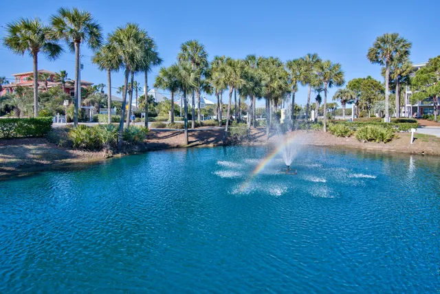 a view of a swimming pool with a table and chairs