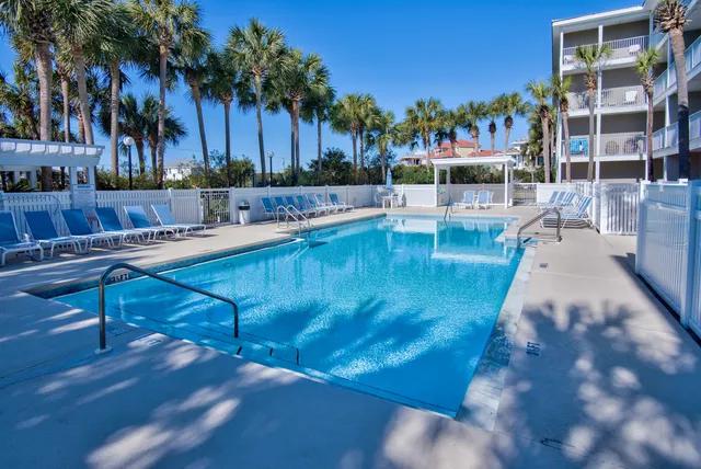 a view of a swimming pool with a patio