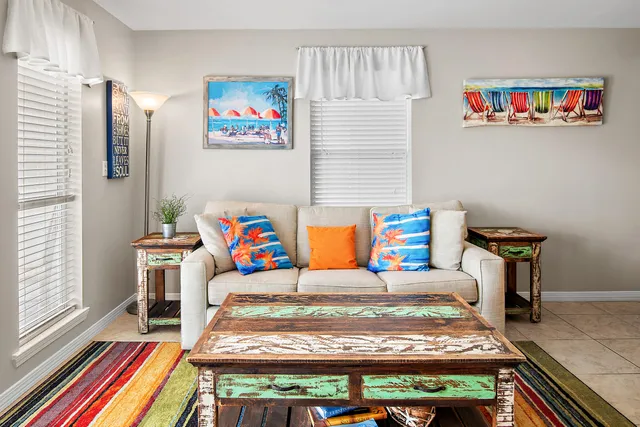 a bedroom with a bed and a book shelf