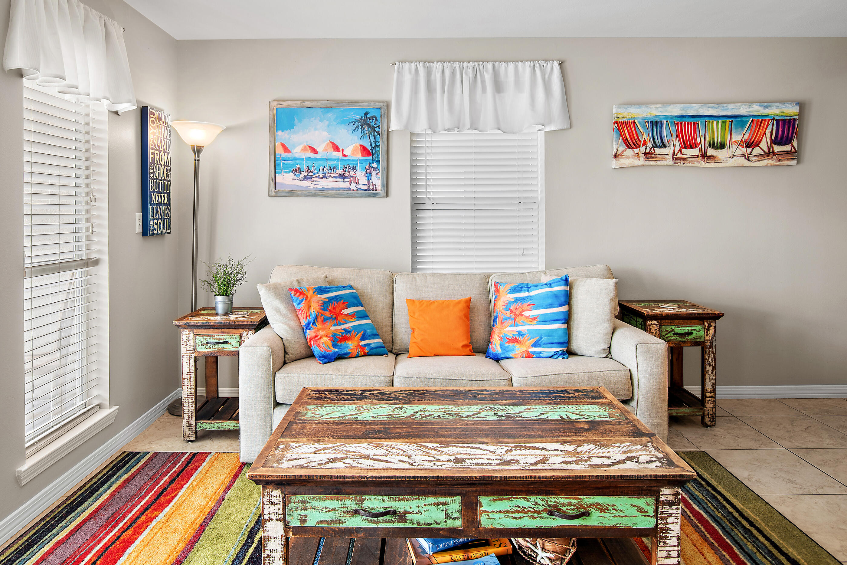 144 Spires Lane, Unit 107 Santa Rosa Beach, FL 32459 - Photo 5 of 34 a bedroom with a bed and a book shelf