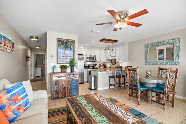 a living room with furniture and a rug