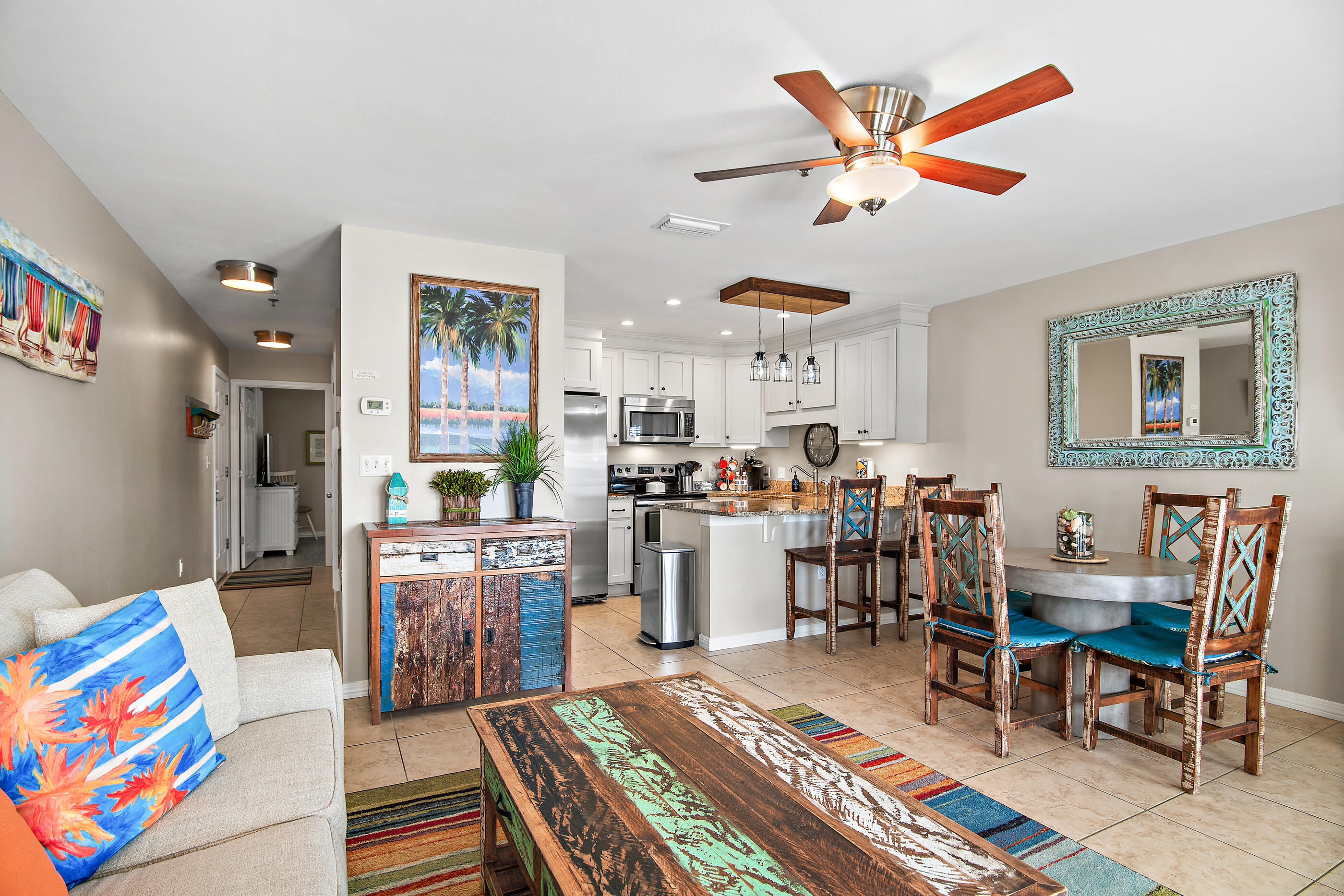 144 Spires Lane, Unit 107 Santa Rosa Beach, FL 32459 - Photo 6 of 34 a living room with furniture and a rug
