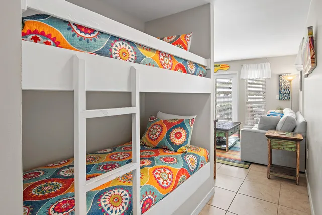 a utility room with toys and a painting on the wall