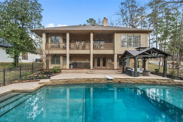 a front view of a house with swimming pool