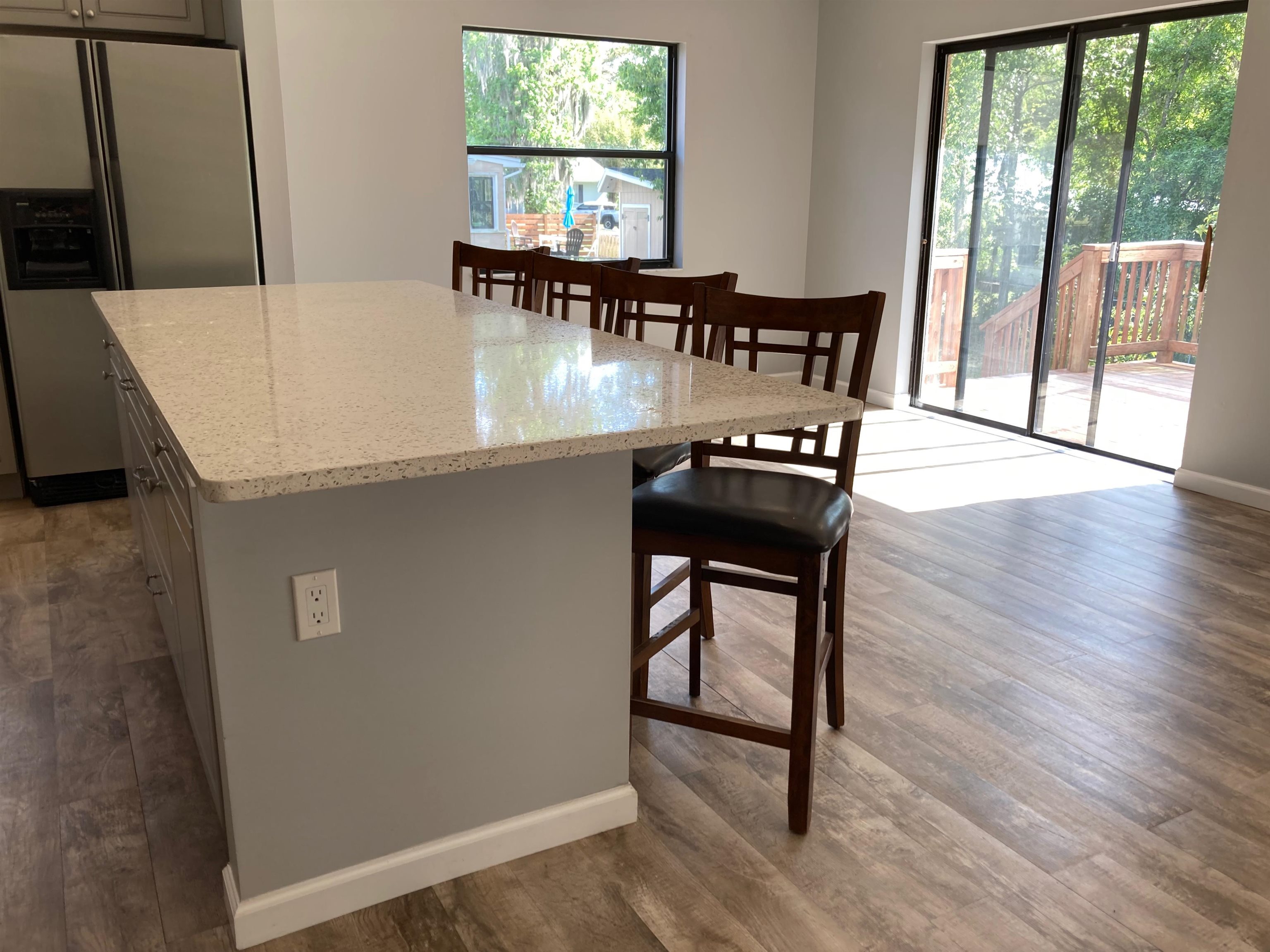 356 Cypress Road St. Augustine, FL 32086 - Photo 11 of 40 a view of a dining room with furniture and wooden floor