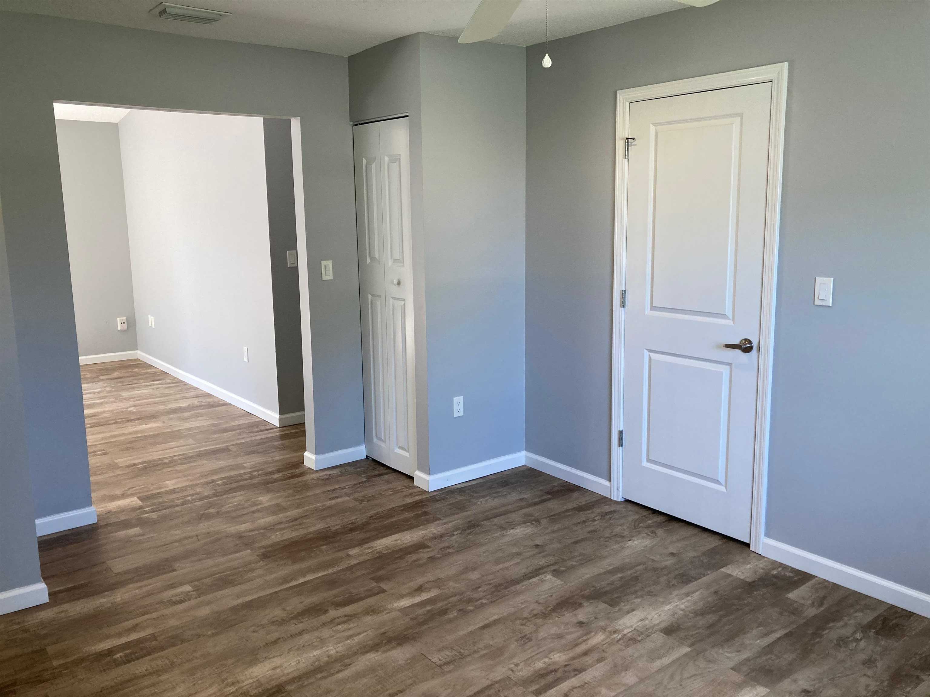 356 Cypress Road St. Augustine, FL 32086 - Photo 21 of 40 an empty room with wooden floor and closet