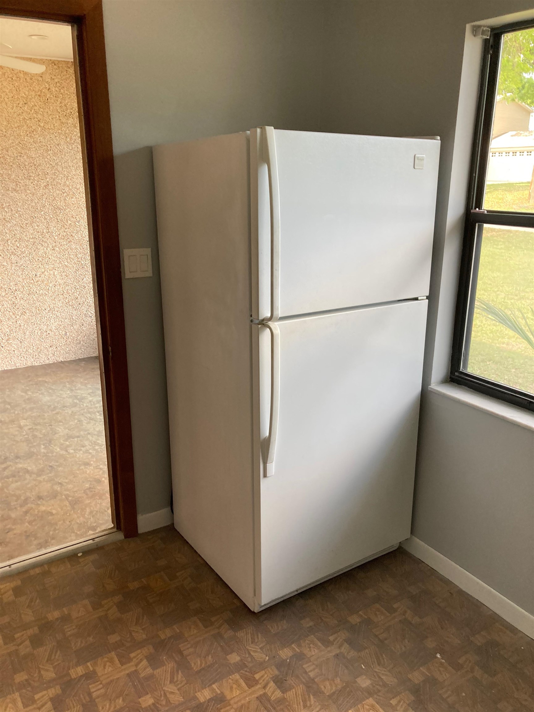 356 Cypress Road St. Augustine, FL 32086 - Photo 27 of 40 a white refrigerator freezer sitting in a kitchen