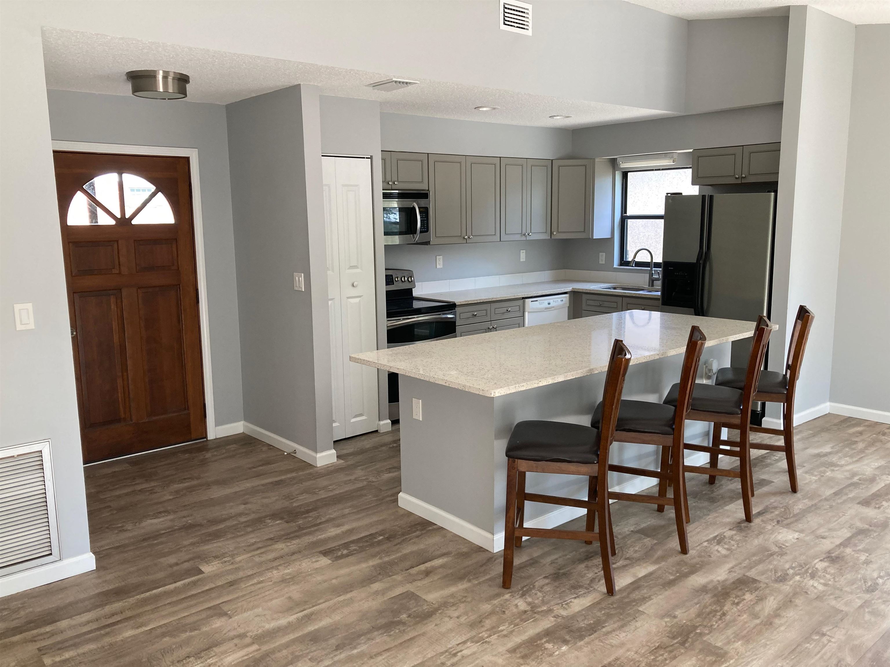 356 Cypress Road St. Augustine, FL 32086 - Photo 8 of 40 a view of a dining room with furniture and wooden floor