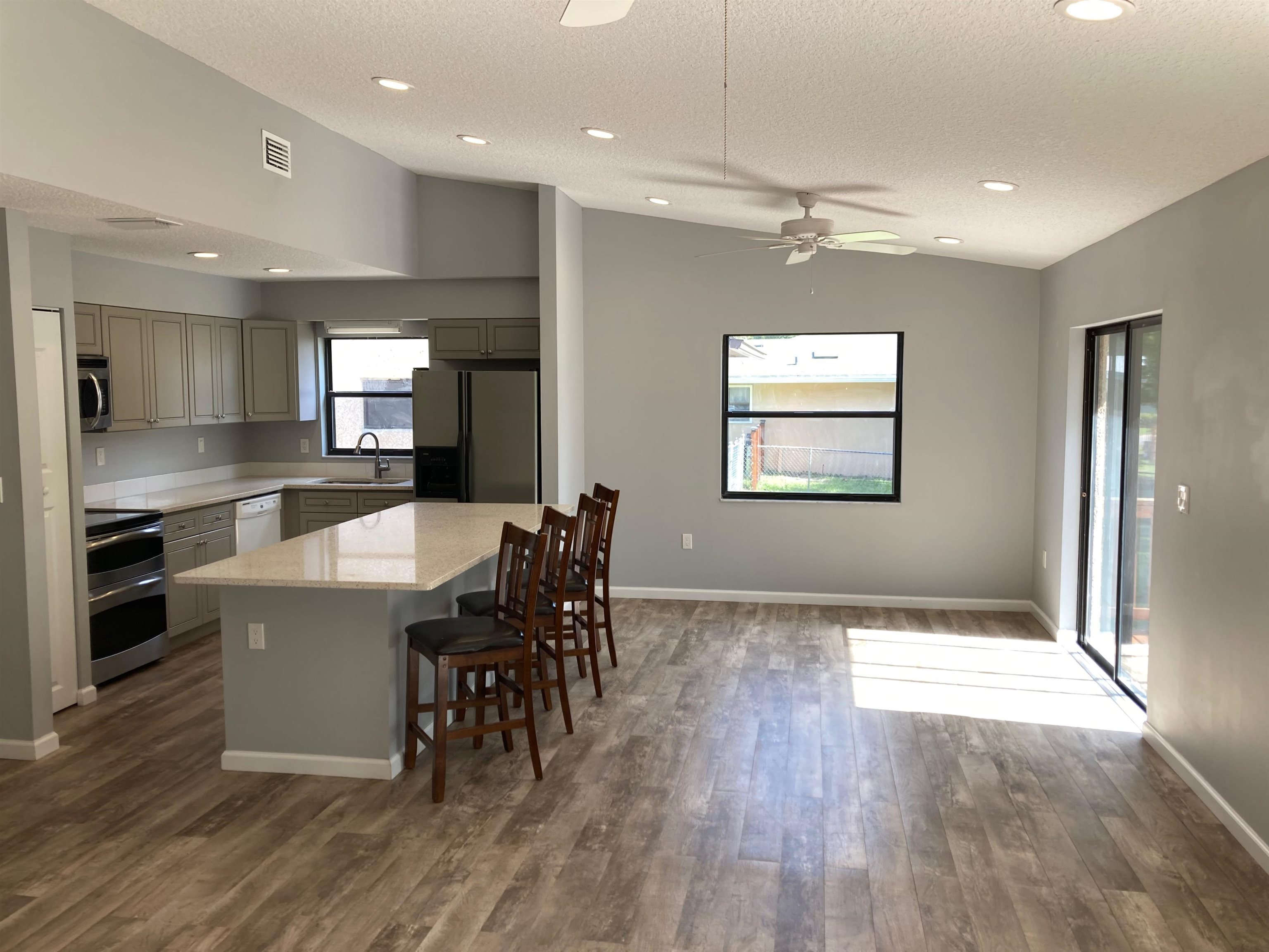 356 Cypress Road St. Augustine, FL 32086 - Photo 10 of 40 a view of a dining room with furniture window and wooden floor