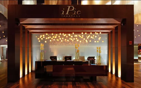 a view of a balcony with a swing chair