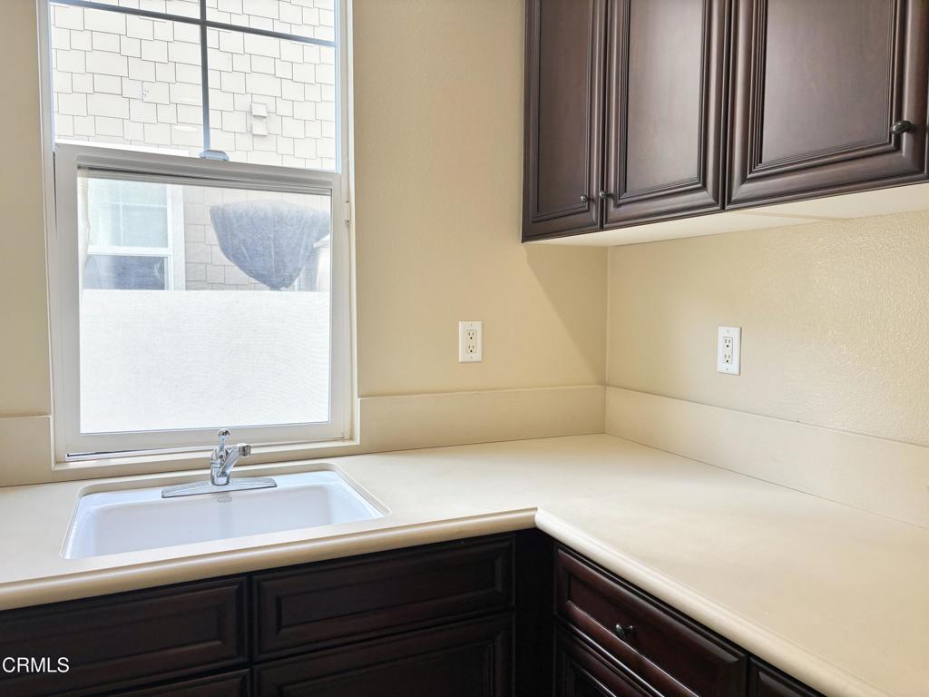 1702 Aleutian Way Oxnard, CA 93035 - Photo 14 of 73 a view of a sink and cabinets