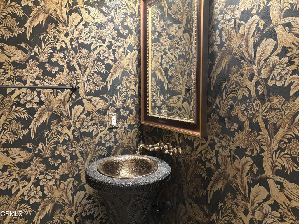 1702 Aleutian Way Oxnard, CA 93035 - Photo 16 of 73 a bathroom with a sink and mirror with toilet