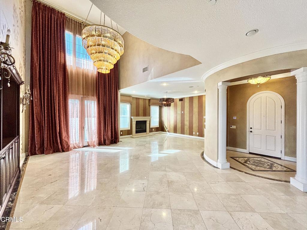 1702 Aleutian Way Oxnard, CA 93035 - Photo 17 of 73 a view of an entryway with a chandelier