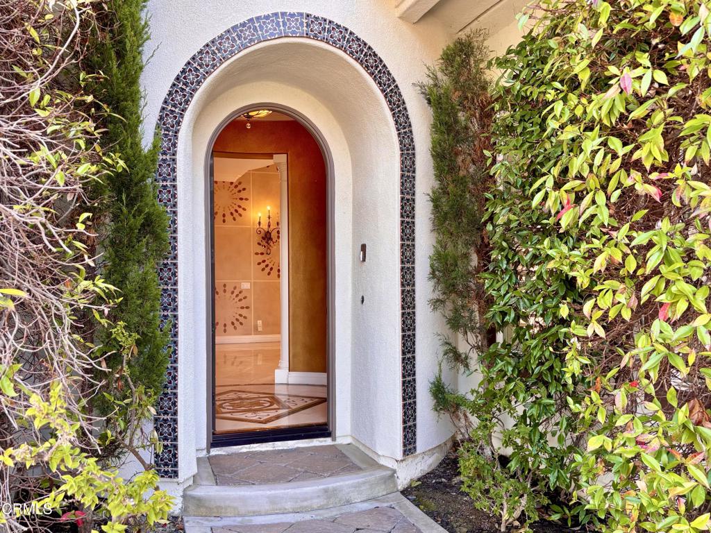 1702 Aleutian Way Oxnard, CA 93035 - Photo 2 of 73 a front view of a house with a garden