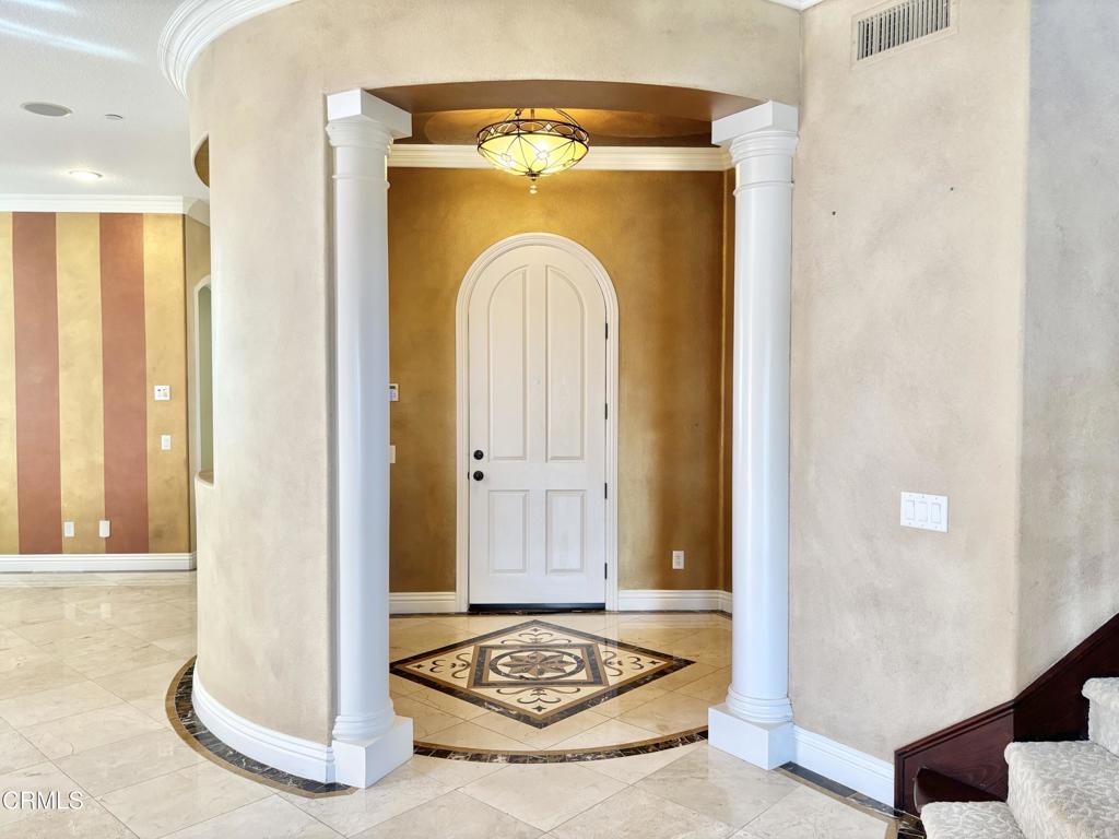 1702 Aleutian Way Oxnard, CA 93035 - Photo 32 of 73 a view of a entryway door with couch