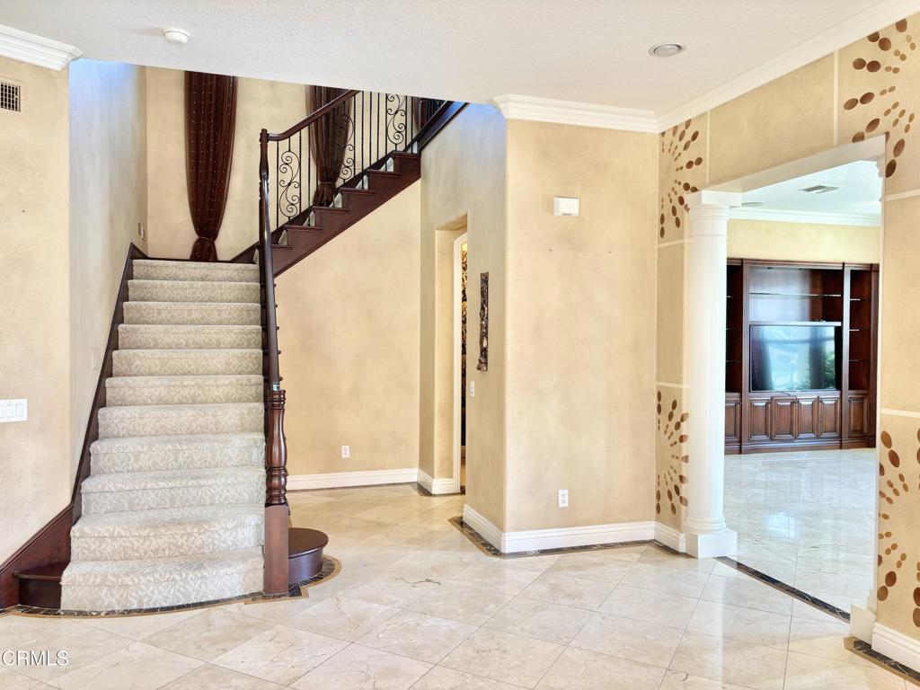 1702 Aleutian Way Oxnard, CA 93035 - Photo 33 of 73 a view of entryway and hall with wooden floor