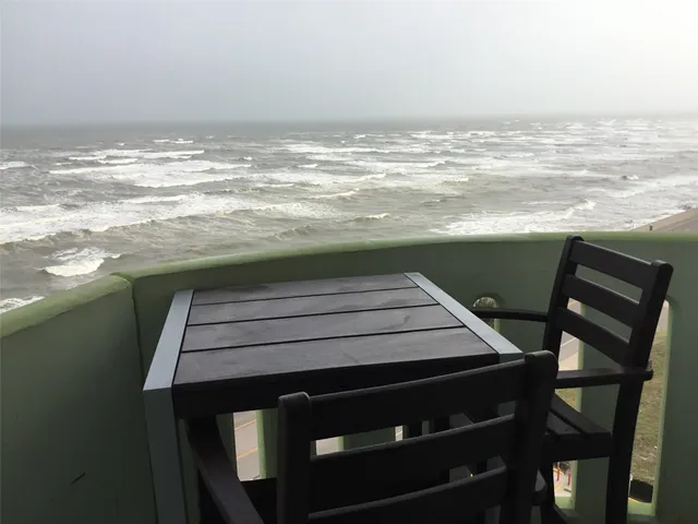 a bedroom with a bed and cabinets