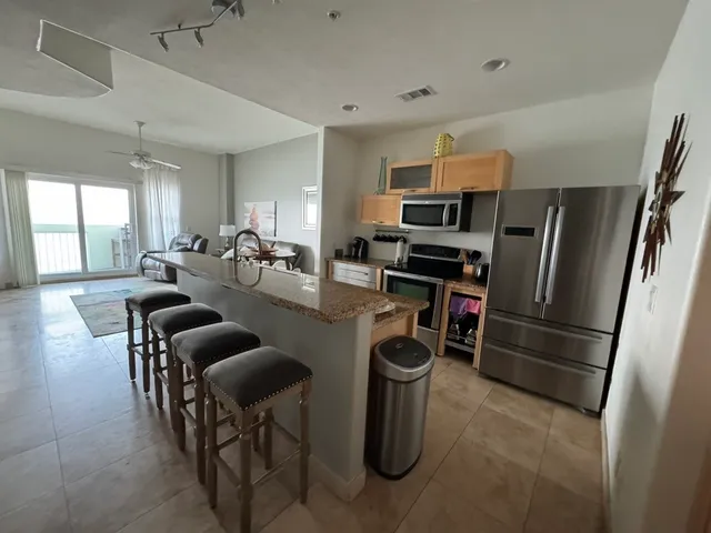 a view of a workspace with furniture and a couch