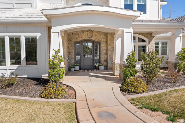 2917 Old Farm Road Washington, UT 84780 - Photo 12 of 105 Property entrance featuring a porch and stone siding