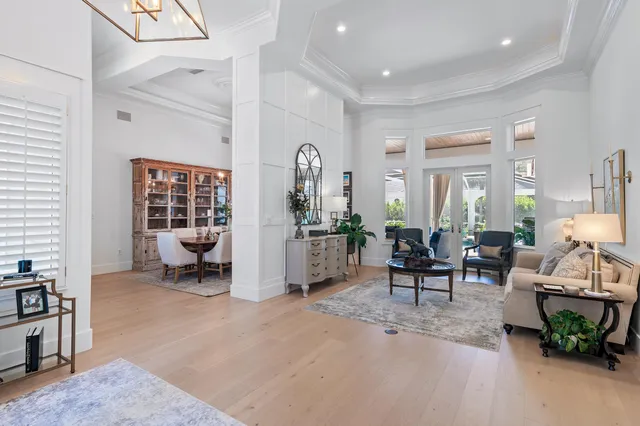 a living room with furniture and a area