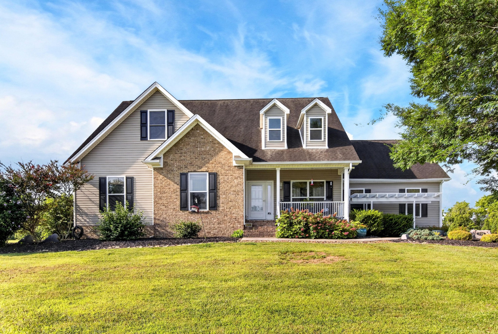 759 Pinhook Road Calhoun, TN 37309 - Photo 1 of 70 a front view of house with yard and green space