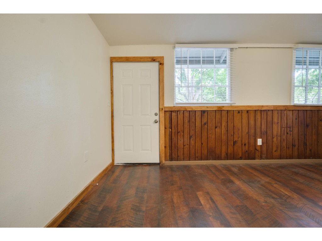 106 South Ave A, Unit E Elgin, TX 78621 - Photo 16 of 30 a view of wooden floor