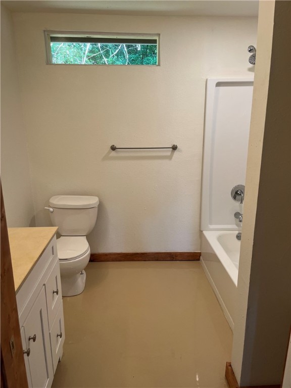 106 South Ave A, Unit E Elgin, TX 78621 - Photo 5 of 30 a bathroom with a toilet a sink and bathtub