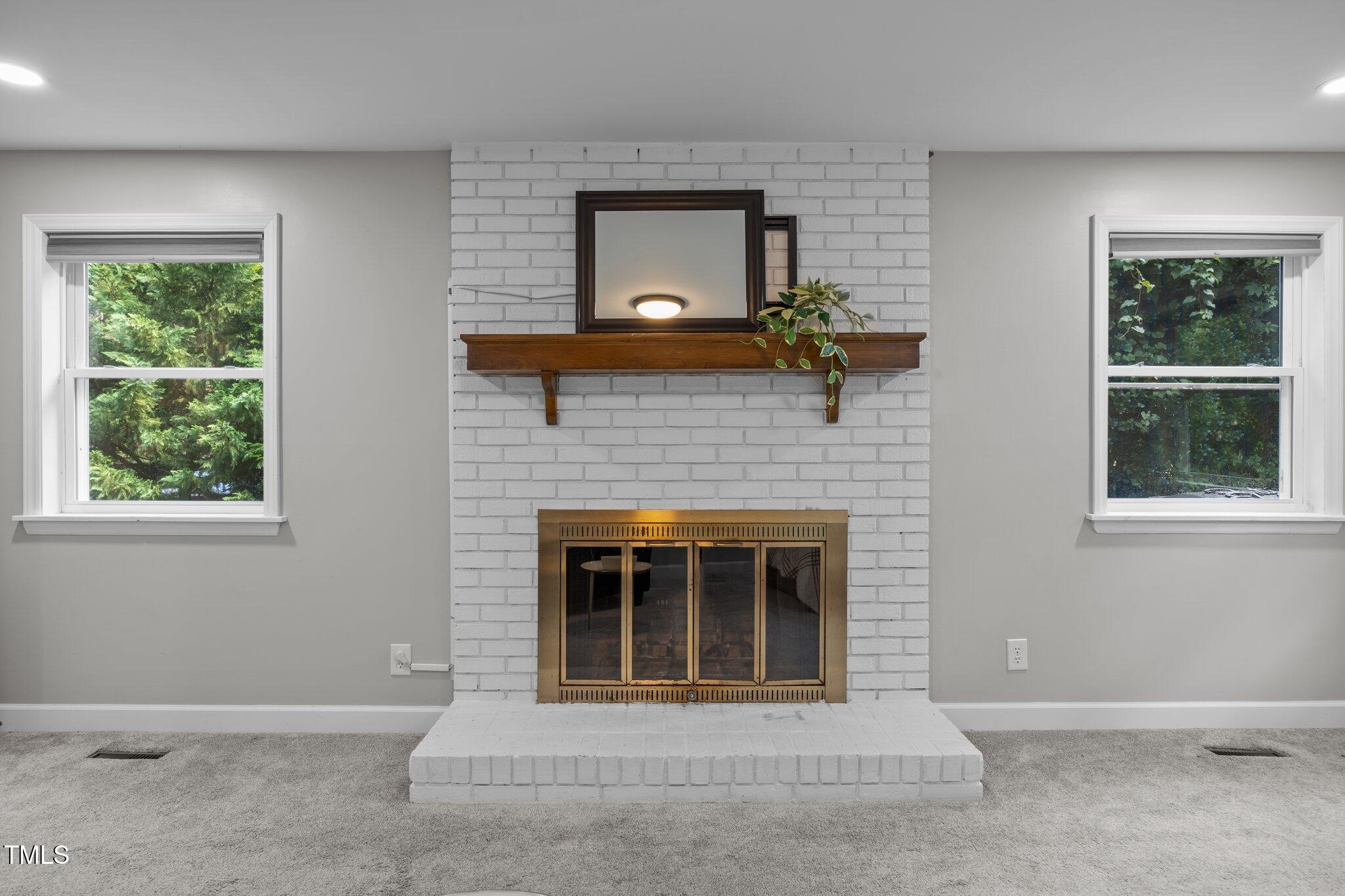 4011 Garrett Road Durham, NC 27707 - Photo 29 of 46 largest primary, with fireplace