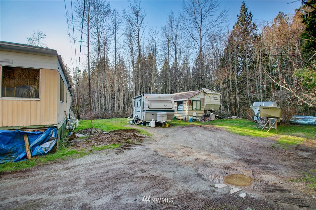 1754 Butler Creek Road Sedro-Woolley, WA 98284 - Photo 3 of 14 a small house in middle of the forest