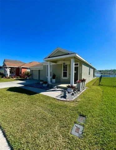 a front view of a house with swimming pool