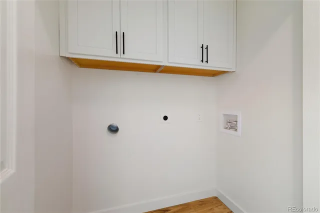 a bathroom with a sink and a window