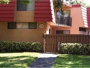 8117 Severn Drive, Unit C Boca Raton, FL 33433 - Photo 1 of 11 a view of a backyard with pathway