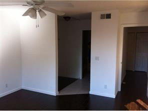 8117 Severn Drive, Unit C Boca Raton, FL 33433 - Photo 10 of 11 wooden floor in an empty room