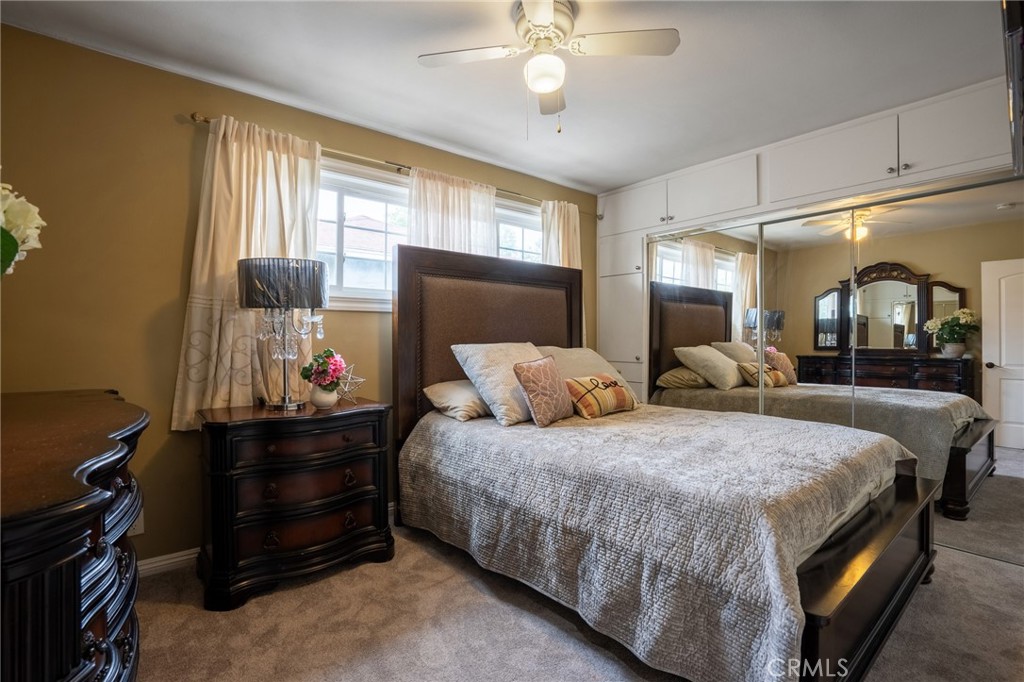 415 South Taper Avenue Compton, CA 90220 - Photo 17 of 32 a bedroom with bed and window