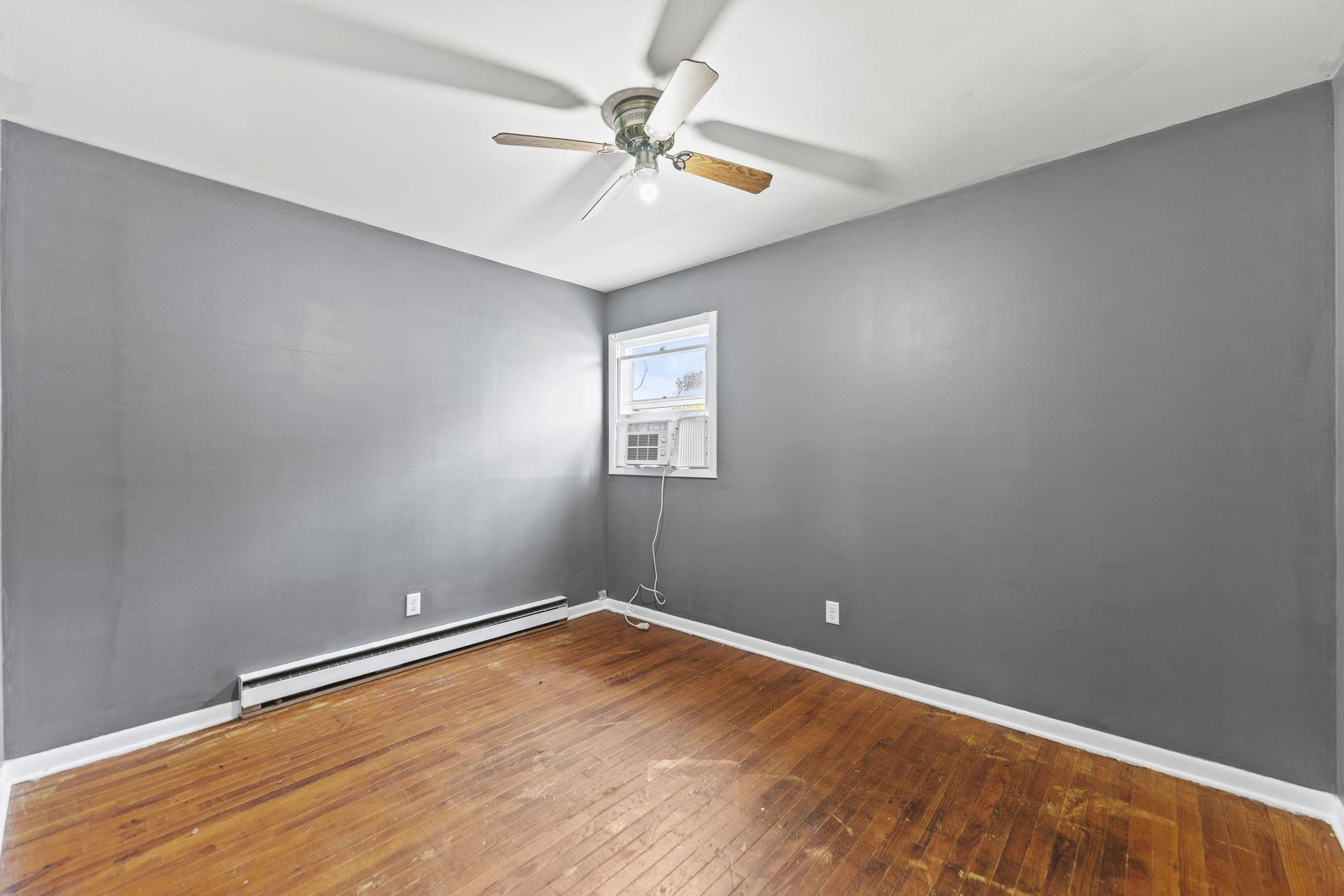 729 West Perry Street Belvidere, IL 61008 - Photo 17 of 27 an empty room with a window and closet